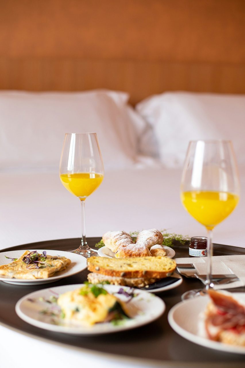 Breakfast and drinks set out on a table